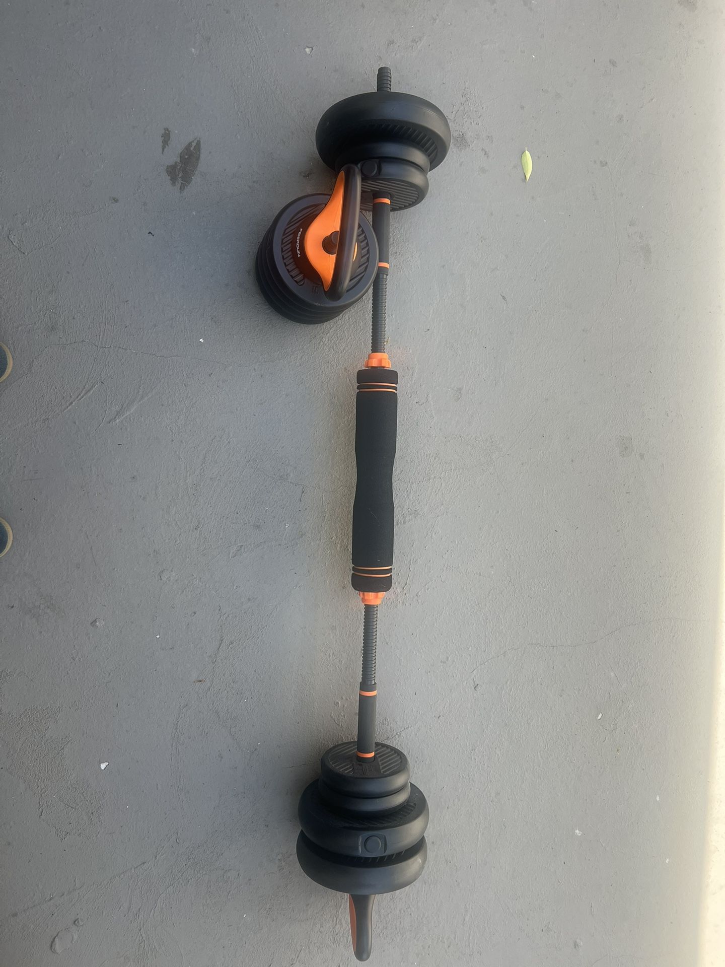 Set Of Adjustable Dumbbells