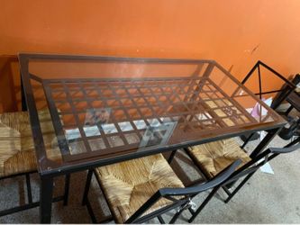 Glass table with 4 chairs