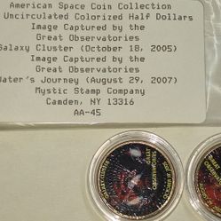 2-coin set from the American Space Coin Collection featuring colorized, uncirculated U.S. Kennedy half dollars. 
The set includes a "Galaxy Cluster" c