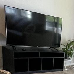 Black media console with storage