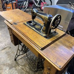 Antique Singer "Red Eye" Treadle Sewing Machine - 6 Drawer Oak Cabinet (Working)