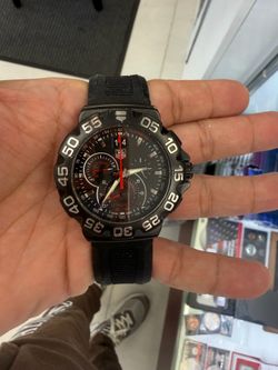TAG Heuer Formula 1 Chronograph there, reference CAH1012.RPH0415. This is the black PVD-coated version with the rubber strap.