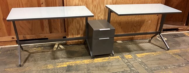 $250. 2 Metal glasstop desk w/ metal file cab. $125 each. FREE DELIVERY IF YOUR 5-8miles away