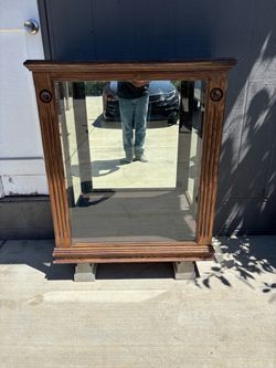 Trophy case with mirror back