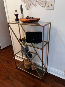 Rustic gold glass console table
