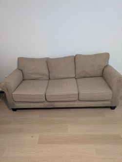 Free couch because I'm moving (note, there are stains)