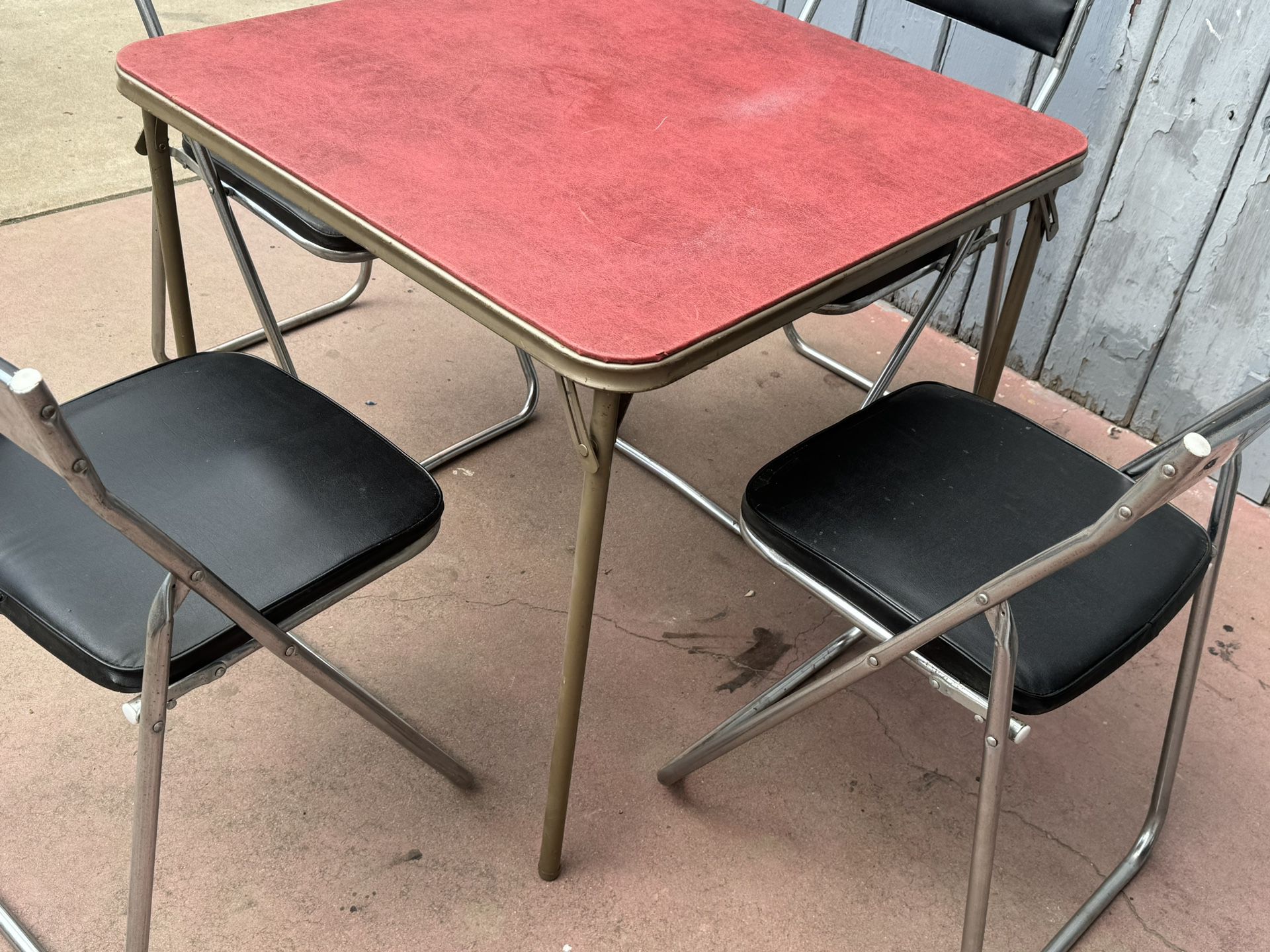 Metal Table And Four Regular Chairs In Good Condition 