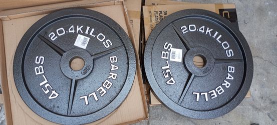 OLYMPIC WEIGHT PLATES. 2X45.LBS.BRAND NEW IN BOX