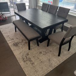 Used Dining Table With Chairs, Bench, And Rug 