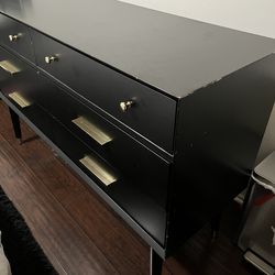 Modern black 6-drawer dresser with brass hardware