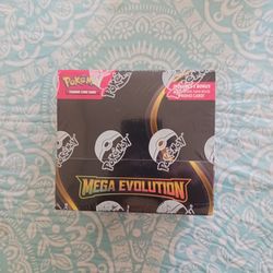 Mega evolution booster box with stamped promo