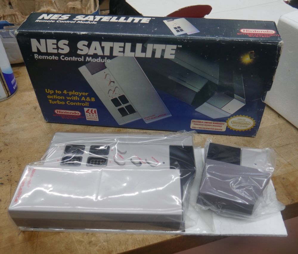 Nintendo NES Satellite Wireless 4-Player Adapter NEW OPEN BOX. BOX WAS OPEN FOR INSPECTION.
