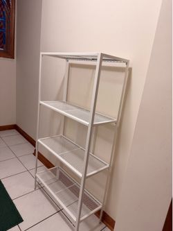 White metal mesh shelf