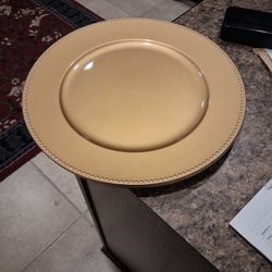 4 Gold Charger plates Plastic Material $10