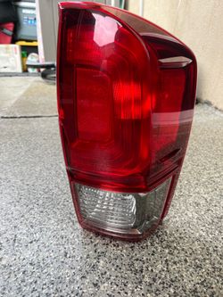 Toyota Tacoma OEM tail light right side !!
