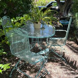 Table And 4 Rocking Wrought Iron Chairs