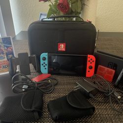 Nintendo Switch With Mario Game and traveling case