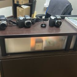 Three Kodak cameras