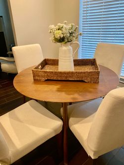Solid round kitchen table no chairs!