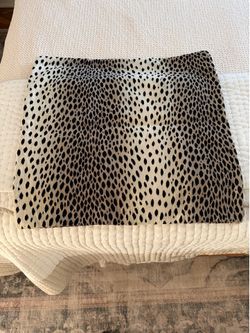 Couch  Cheetah print pillowcases four of them.  covers
