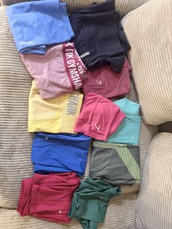 11 leggings (Gymshark, Lululemon, Alo) for $200