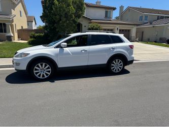 2008 Mazda CX9 four-cylinder automatic fully loaded third roll seating 8 passenger very good engine was told needs transmission sensor bought a new ca