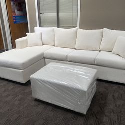 Cream White Sectional And Ottoman