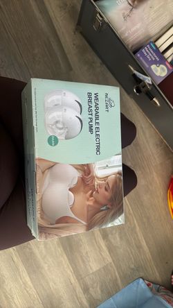 Wearable electric breast pump