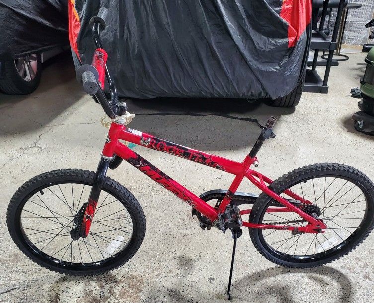 HUFFY "ROCK IT" RED & BLACK BOYS BIKE. (NO SEAT)