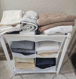 Towel Holder, & 17 Bath & Beach Towels, 15 Washcloths, 7-Handtowels & Bath mat all for $29.99  -  Firm