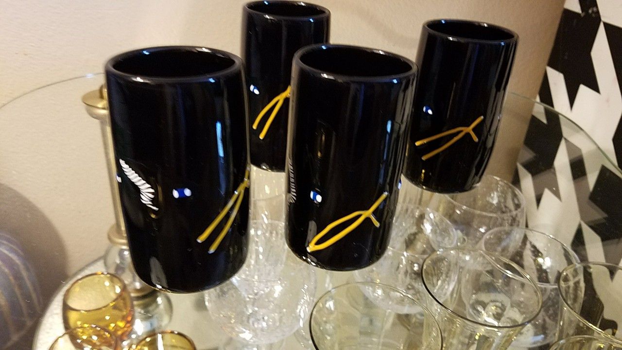 Four signed hand blown glasses