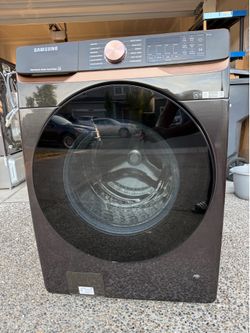 Samsung 5.0 Cu.Ft capacity smart front load washer.