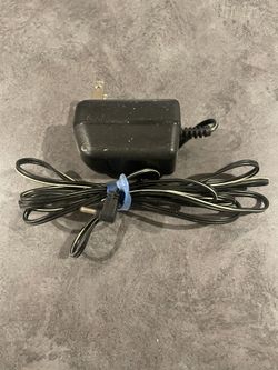 Power Supply Model # V090025A12 Input 120V Output 9V