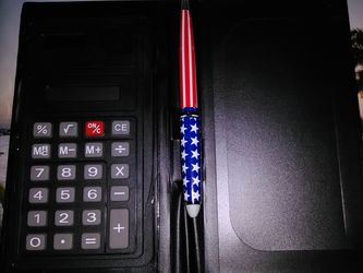 Calculator with case and pen