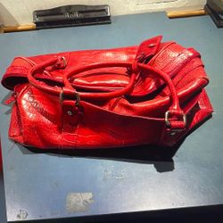 Red leather carrying bag smoke free, great condition