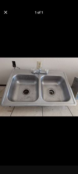 Stainless steel sink and faucet