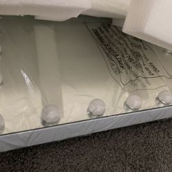 Vanity Mirror With Adjustable Light