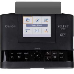 Photo printer (Canon Selphy 1300, paper & ink)