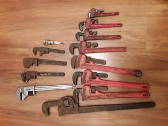Lots of 13 pipe wrenches used