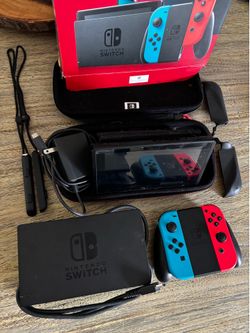 Nintendo Switch with case and accessories