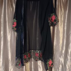 Black kimino with roses on arm and border