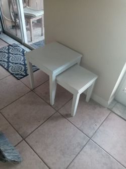 Two White Small Tables
