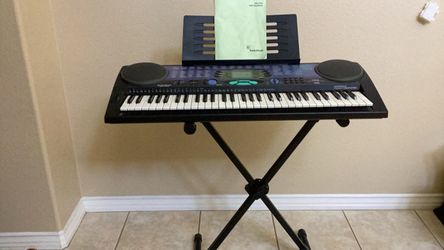 Keyboard with stand and book