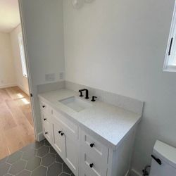 Custom White Oak Bathroom Vanity with Quartz Countertop and soft closing doors Only one left 