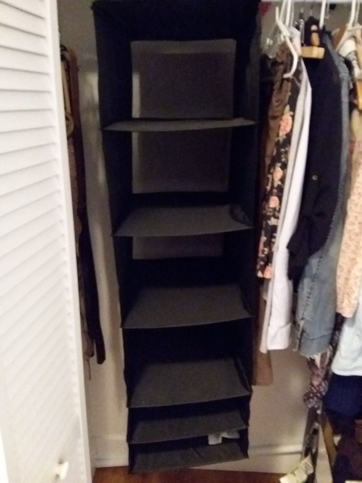 Shelf hanging clothes storage