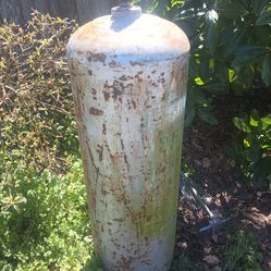 One large propane tank and two small propane tanks