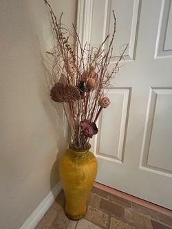 18”H x11”W golden glass vase with arrangements