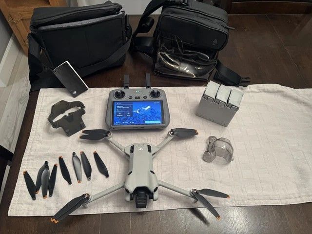 DJI Mini 4 Pro Camera Drone (with RC 2 Remote)
