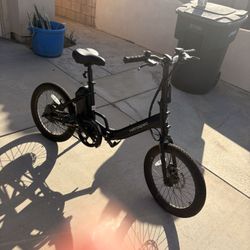 USED ONCE LIKE NEW -RETROSPEC FOLDING E BIKE