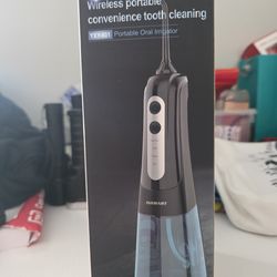 Portable oral irrigator-water pick